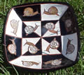 Square plate with snails. Hand made from clay.