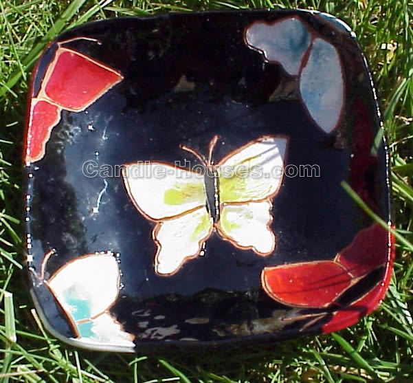 Black clay plate with butterflies