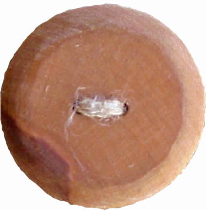 WB07 fruit-tree wood button. Sold in package of 10 pieces.