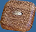 WB02 oak wood button. Sold in package of 10 pieces.